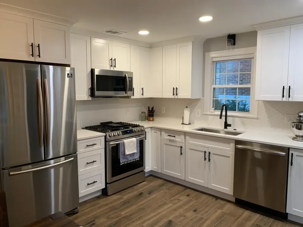 white kitchen cabinets are installed