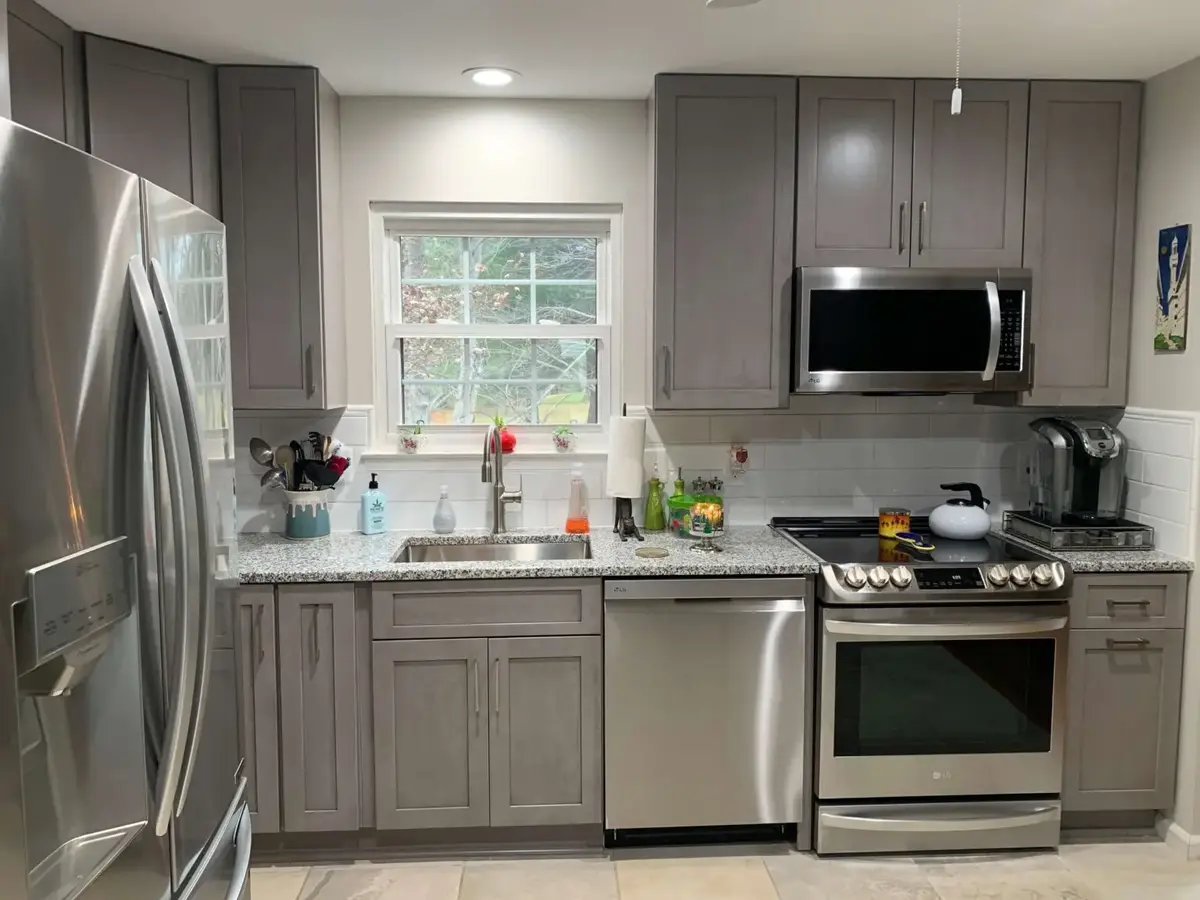 grey kitchen with many drawers