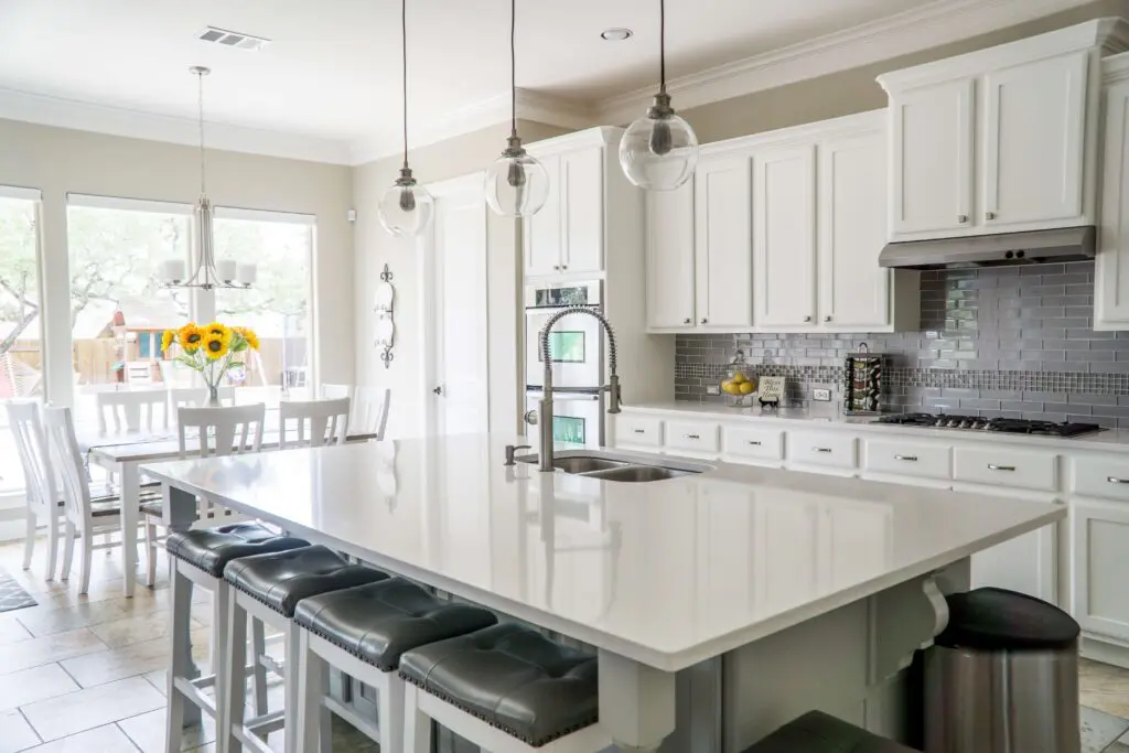 white kitchen with modern island