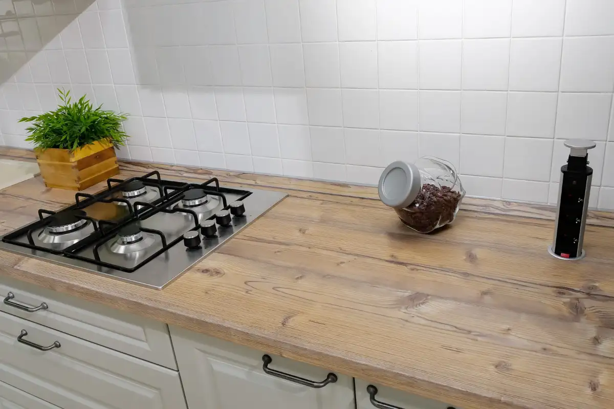 there are kitchen items on wooden countertop