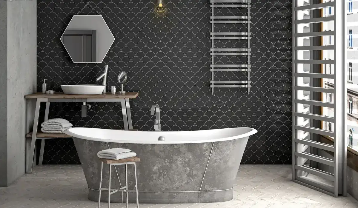 black bathroom with shell shaped tiles