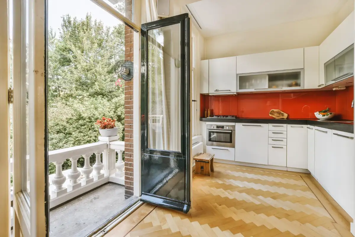 large kitchen with herringbone pattern tile