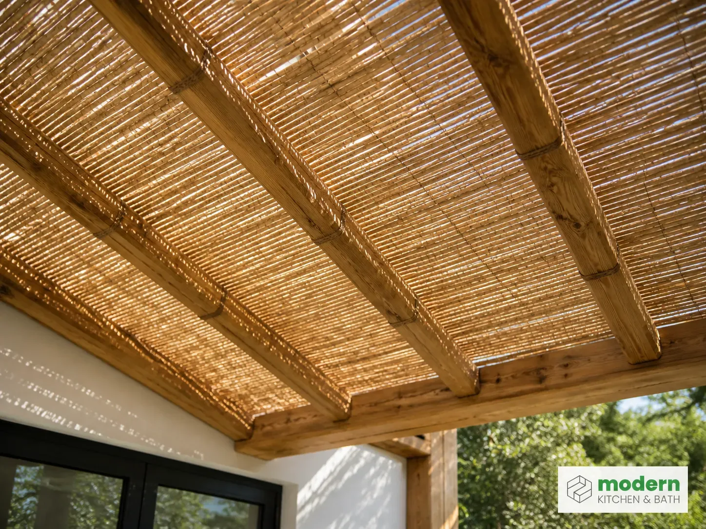 Reed and bamboo topper laid across pergola rafters filtering sunlight