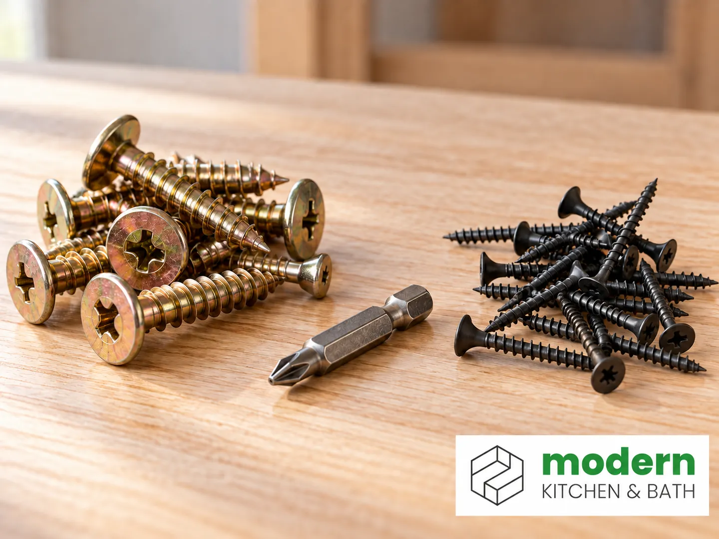 Structural cabinet screws beside thinner black drywall screws for comparison